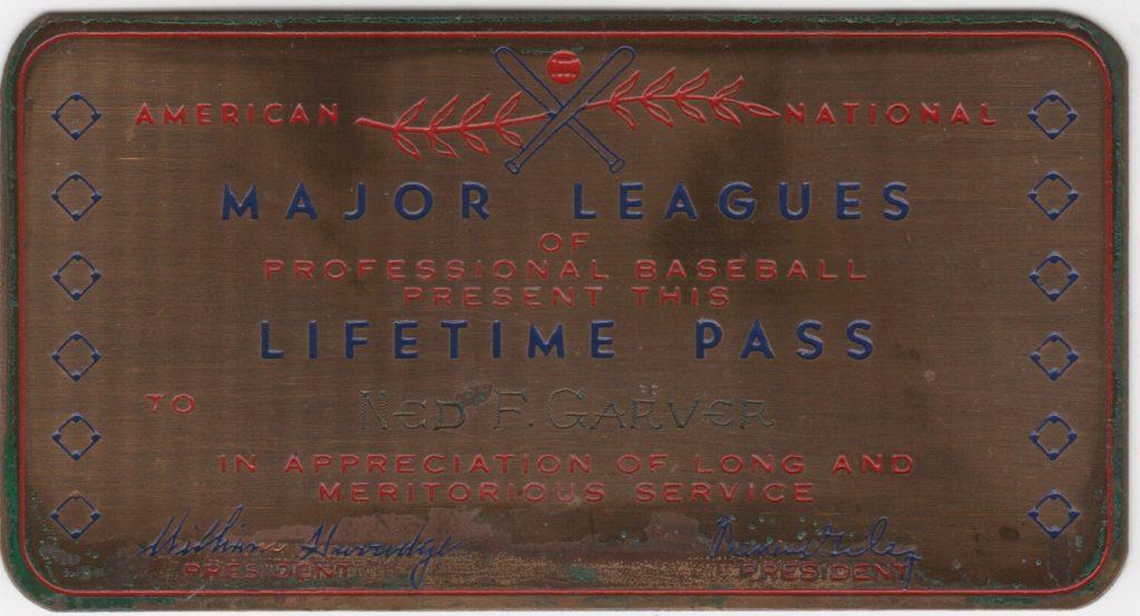 Metal lifetime pass issued to Ned Garver